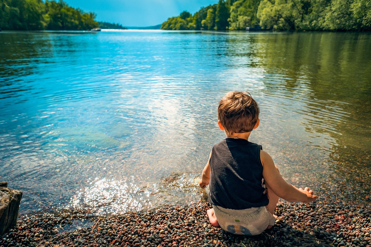 child, boy, lake, water, playing, toddler, kid, little, childhood, summer, happiness, play, joy, white, caucasian, outdoors, beach, nature, shore